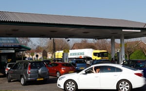Petrol: Loughborough: A petrol tanker driver makes a delivery
