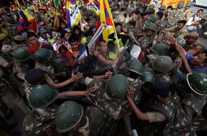 Tibet Protests: Tibetan exiles scuffle with the police during a protest