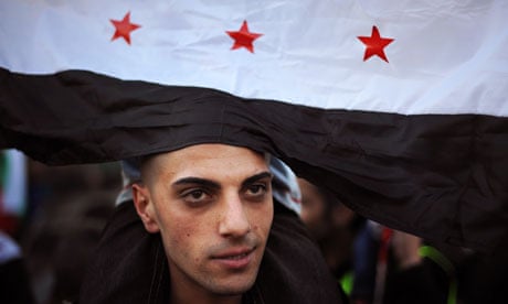 A Syrian migrant attends a rally against President Bashar al-Assad at the Syrian embassy in Sofia