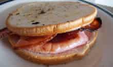 A bacon sandwich made with milk roll bread