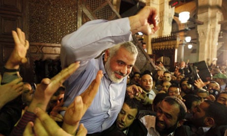 Hamas leader Ismail Haniyeh is carried by supporters