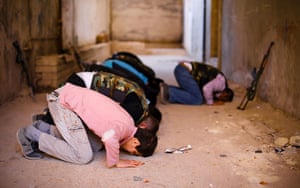 Aleppo, Syria: Rebels of the Free Syrian Army take time to pray 