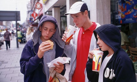 Adolescents eating junk food