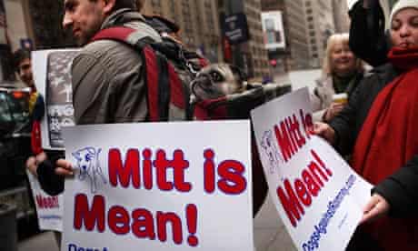 Protesters from a campaign group called Dogs Against Romney hold placards reading 'Mitt is Mean!'
