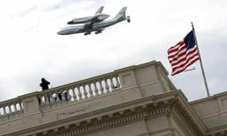 Space Shuttle Discovery flies over the US Capitol