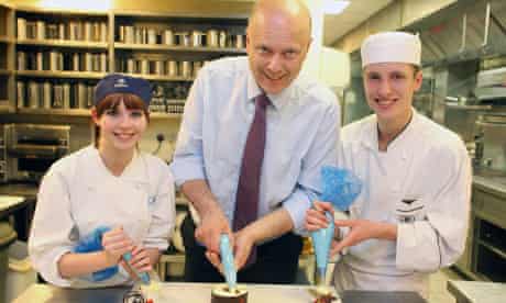 Employment minister Chris Grayling with apprentice chefs at the Doubletree Hilton Hotel
