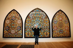 Damien Hirst: Damien Hirst poses infront of 'Doorways to the Kingdom of Heaven'