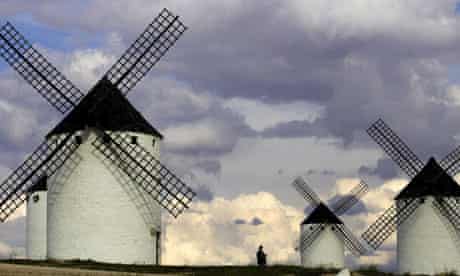 Tourists visit the famous ancient windmillsCastilla-La Mancha