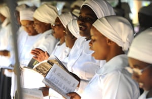 Easter Sunday: Women pray and sing during an Easter Sunday service at an outdoor church