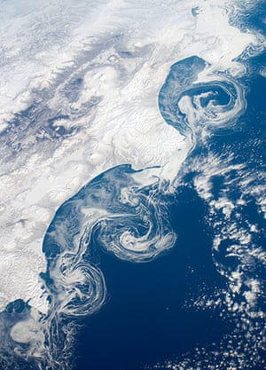 Satellite Eye on Earth: Ice Floes Along the Kamchatka Coastline