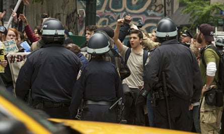 Occupy Wall Street supporters are corralled by police officers in New York on May Day.