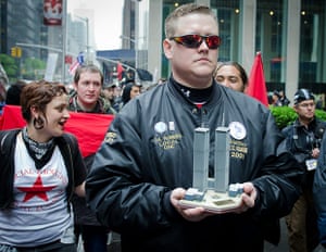 Occupy May Day: WTC first responder Walter Hillegass from New York marches with protesters