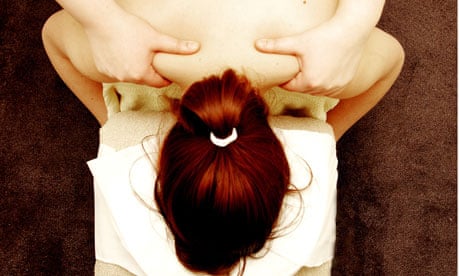 A woman having a therapeutic massage