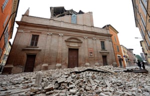 earthquake in italy: Debris of a collapsed church blocks a road in Finale Emilia 