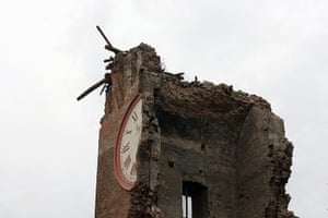 earthquake in italy: the  tower which collapsed following an earthquake in Finale Emila