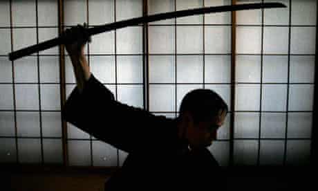 Japanese ancient martial arts master Yoshinori Kouno demonstrates his skills in Tokyo