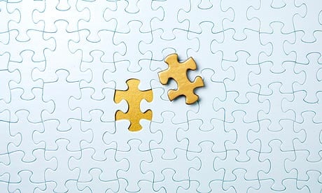 Jigsaw puzzle with gold piece
