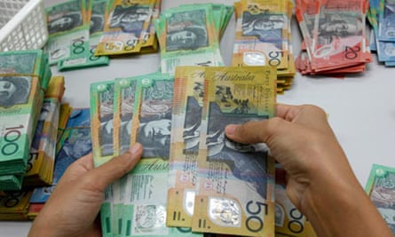 Australian Dollar Hits 33 Month Low Australia News The Guardian