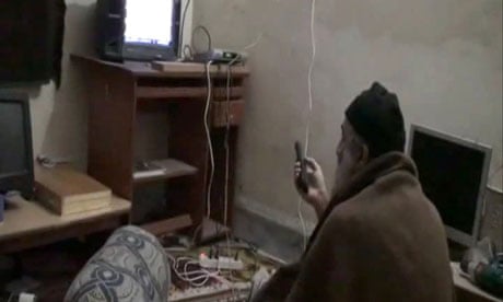 Still image from a video shows al-Qaida leader Osama bin Laden watching TV in his Pakistan compound