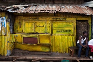 Sierra Leone Architecture: Painted wood and metal brighten a recreation kioskin  Congo Town