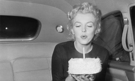 Marilyn Monroe Blowing Out Candle on 30th Birthday Cake