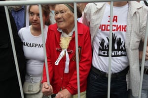 Moscow protests: An elderly woman tkaes part in the opposition rally in Moscow