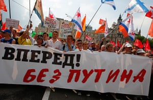 Moscow protests: Protesters carry a banner reading Russia Go Forward without Putin