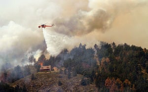 Colorado wildfires: Helicopter drops water on fire close to homes near Horsetooth Reservoir