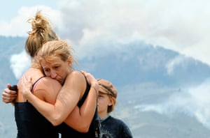 Colorado wildfires: Greenwoods hug as they watch fire burn near their home