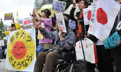 People protest in Tokyo against the Japanese prime minister's decision to restart nuclear reactors