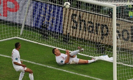 John Terry attempts to clear the ball from Marko Devic's shot
