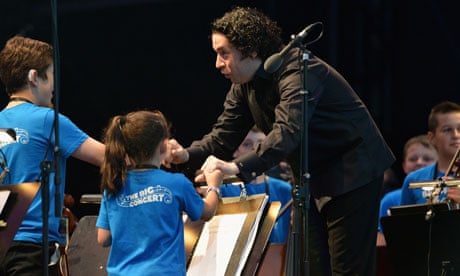 Gustavo Dudamel with two of the Big Noise Orchestra