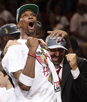 NBA5: The Miami Heat's Chris Bosh celebrates after Game 5 