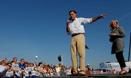 U.S. Republican presidential candidate Mitt Romney and wife speak during campaign event in Michigan