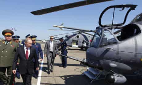 Vladimir Putin inspects Mi-24 helicopters