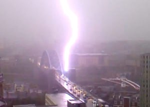 UK Flooding: Tyne and Wear, Newcastle: Lightening stikes the Tyne bridge