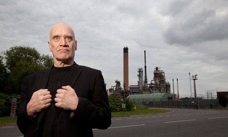 Wilko Johnson  lead guitarist with Dr Feelgood outside Coryton Oil Refinery, Essex