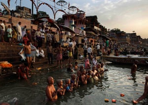24 hours in pictures: Hindu devotees in Varanasi, India