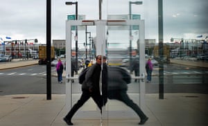 24 hours in pictures: A pedestrian enters a Silver Line bus stop in Boston
