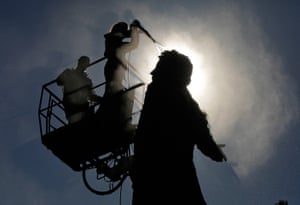 24 hours in pictures: Workers clean the monument of Russian poet Aleksander Pushkin