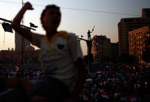 24 hours in pictures: A protester shouts during a demonstration at Tahrir square in Cairo