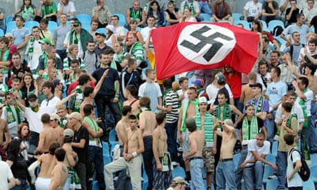 Ukrainian football fans with Nazi flag