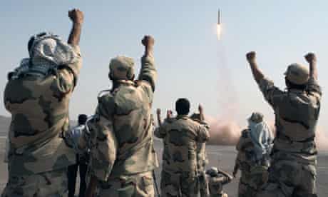 Iran's Revolutionary Guard celebrate the successful test-fire of ballistic missiles