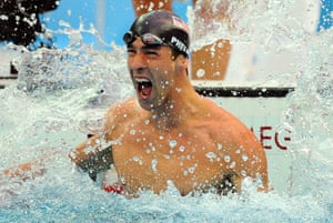phelps gallery: Phelps reacts after winning the men's 100m butterfly 