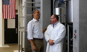 President Obama with an employee during a tour of Summer Garden Food Manufacturing in Boardman, Ohio