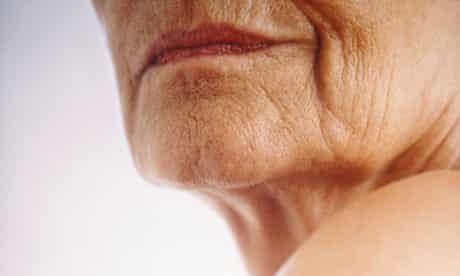Woman's chin and shoulder