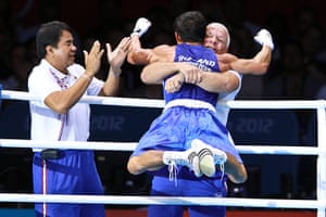 Boxing: Kaeo Pongprayoon of Thailand celebrates with his coach