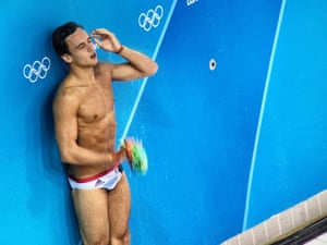 Tom Daley of Great Britain showers at the semi-final of the men's 10m platform.
