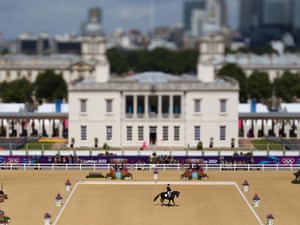 A variable planed lens has been used here to make Carl Hester of Great Britain riding Uthopia look like he's in a model of Greenwich Park rather than the real thing as he competes in the Dressage Grand Prix. Photograph: Alex Livesey/Getty Images