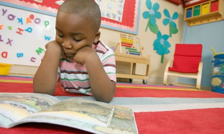 Preschool boy reading